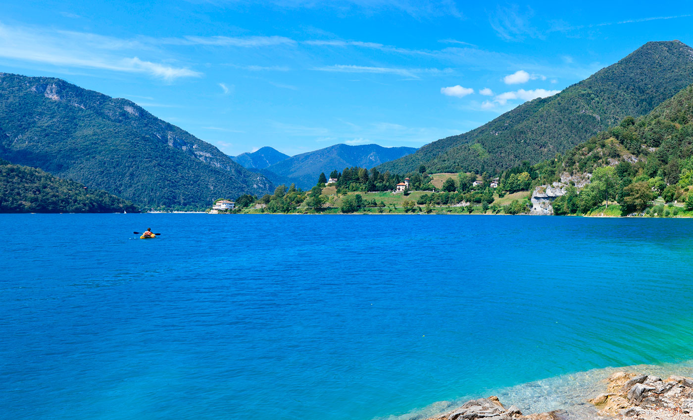 Relaxing on Lake Ledro's green beaches