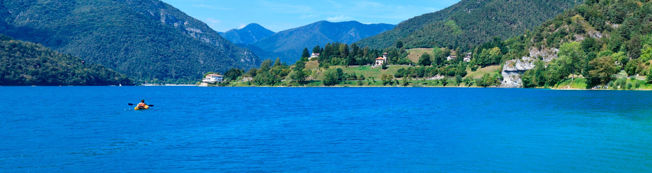 Relaxing on Lake Ledro's green beaches